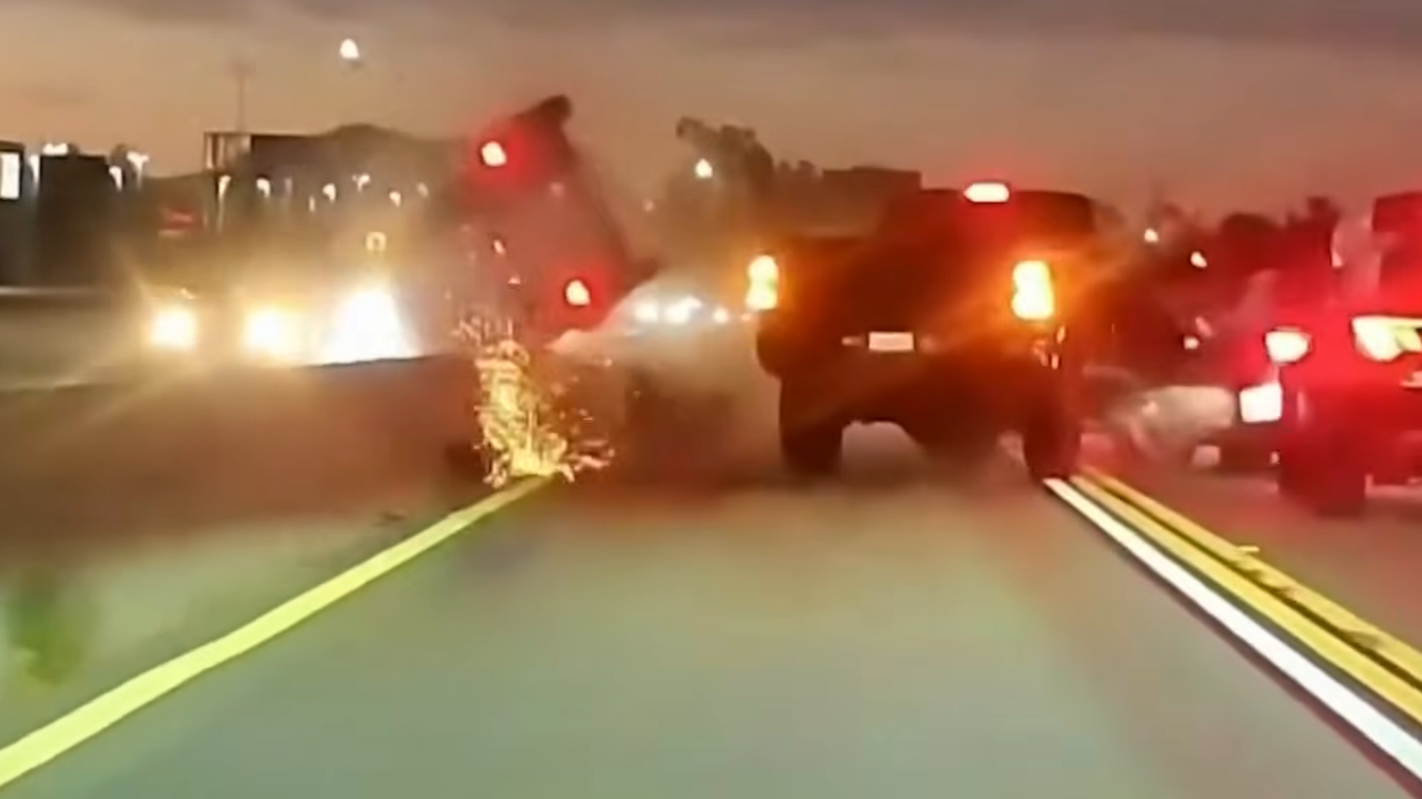 car flips over median on highway