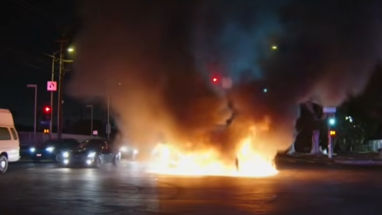 cars lit on fire during LA takeover
