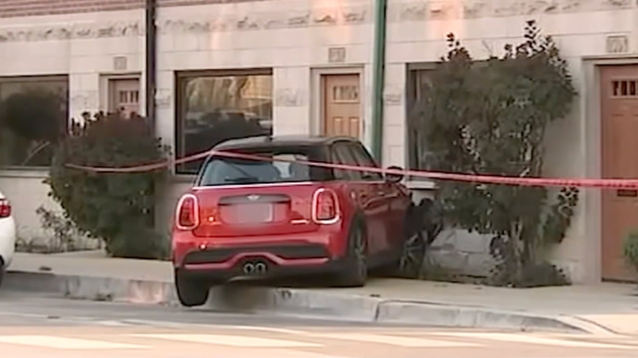 Mini Cooper Finally Pulled From Home After Days Trapped Inside Wall