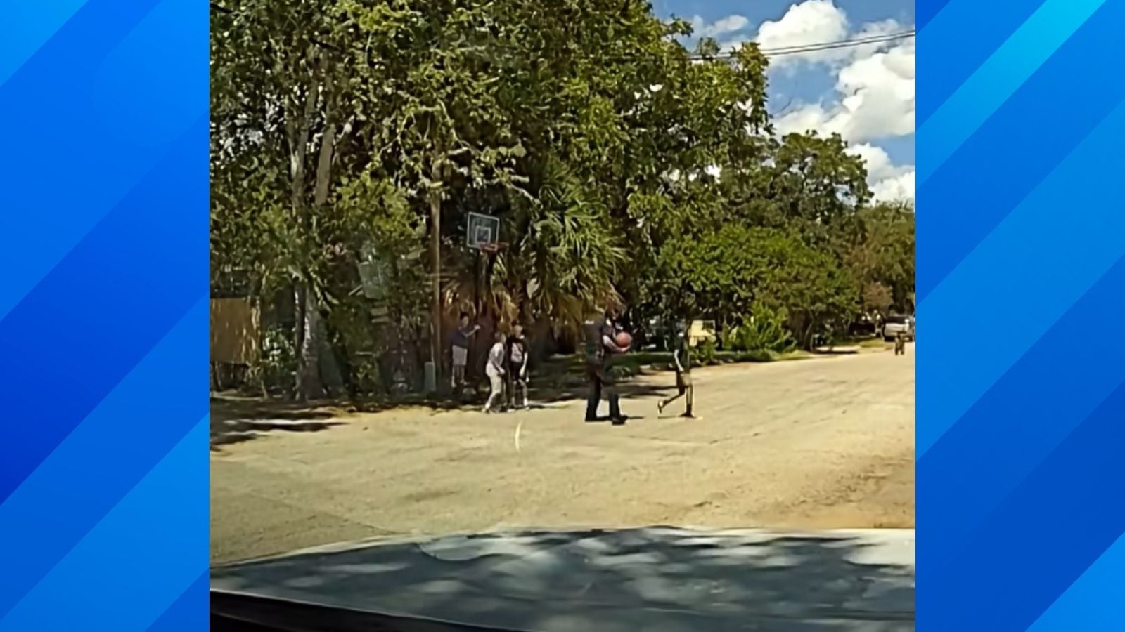 Texas Cop Stops to Shoot Hoops With Local Kids and Proceeds to Throw Nothing but Air Balls