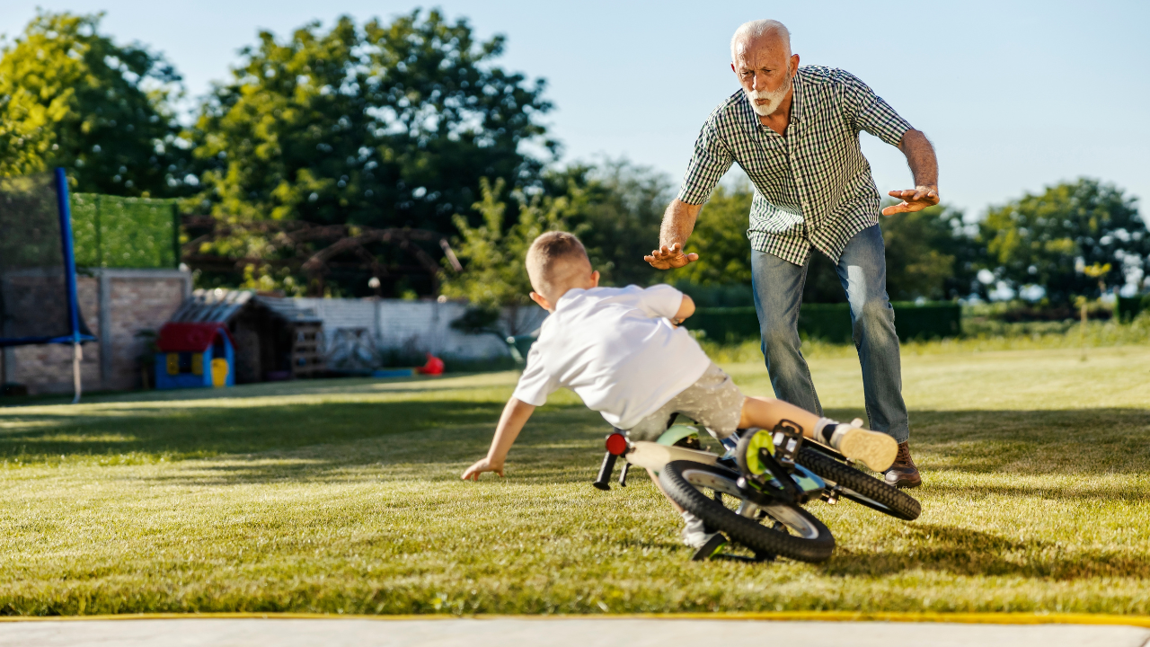grandpa rushes to help kid falling on bike