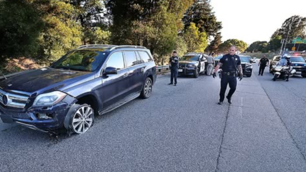 black mercedes suv pulled over