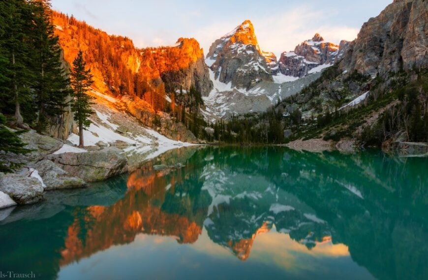 first light at delta lake in wyoming