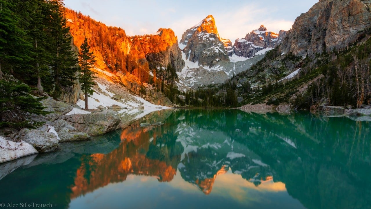 first light at delta lake in wyoming