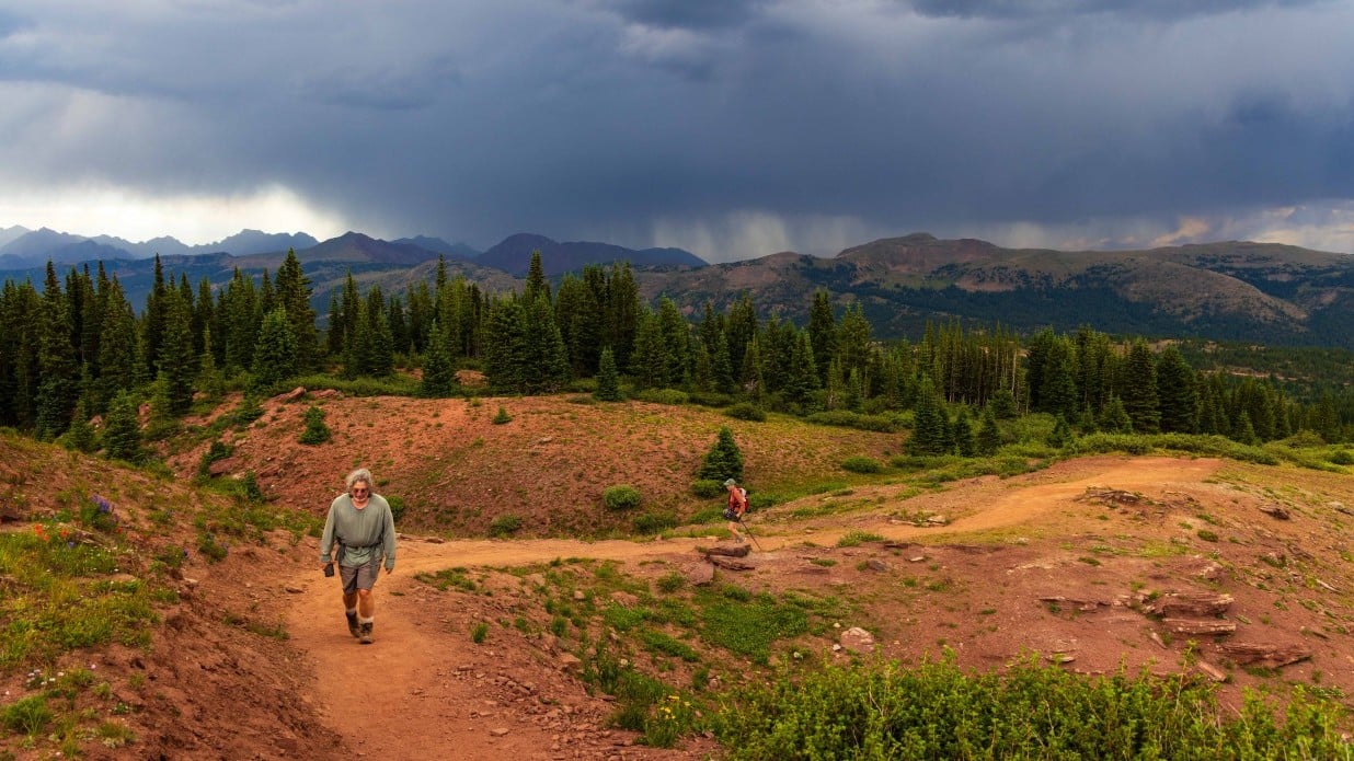 hikers on a trail in colorado