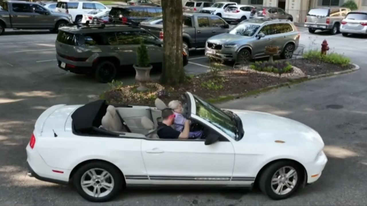 100-year-old Barbara Haig still cruising in her Mustang side view