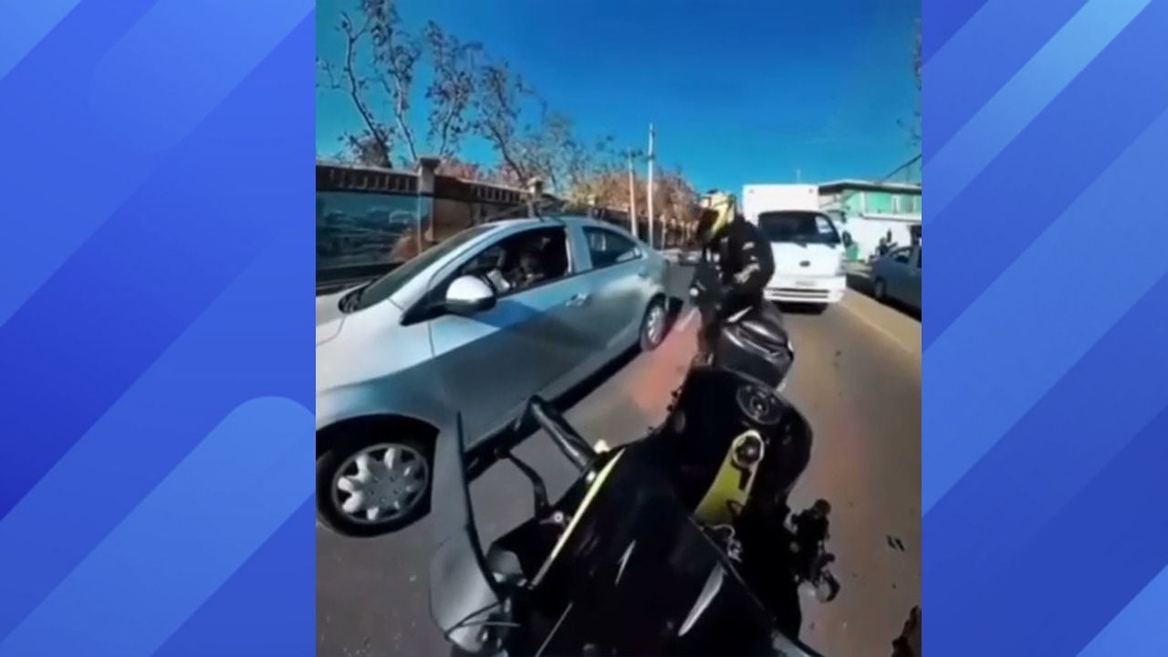 Biker confronts car that hit old man