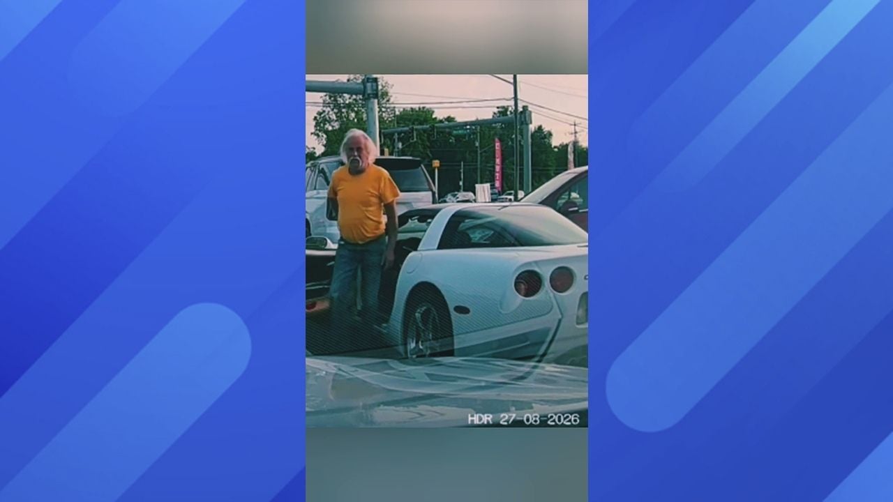 Chevy Corvette wont let SUV out of gas station