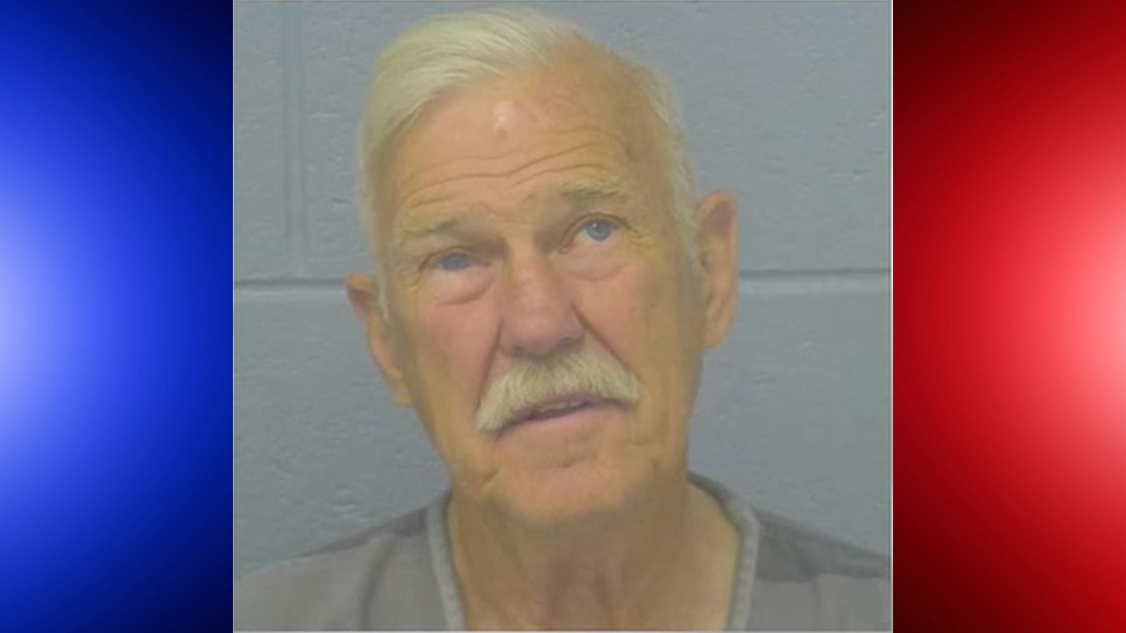 booking photo of Dennis Arthur Cleveland with red and blue background