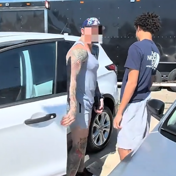 Dad argues with car salesman