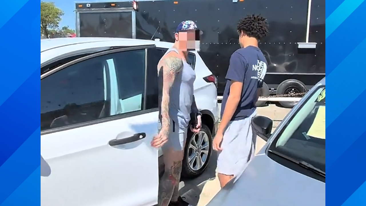 Dad argues with car salesman
